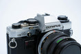Load image into Gallery viewer, Olympus OM-10 – Olympus G.Zuiko 50mm f/1.4 + Free Kodak Gold 35mm Film
