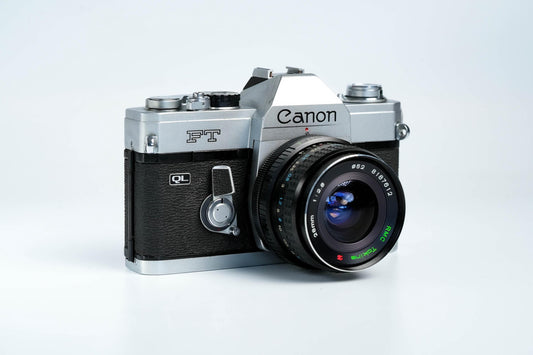 Canon FT QL + Tokina RMC 28mm f/2.8 – Fully functional + free 35mm film