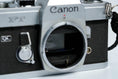 Load image into Gallery viewer, Canon FT QL + 50mm f/1.8 – Fully working + free 35mm film
