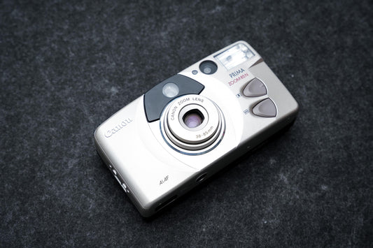 Canon Prima Zoom 85N + gratis 35mm film – 35mm point-and-shoot camera – 1998 – nieuw in doos, old stock