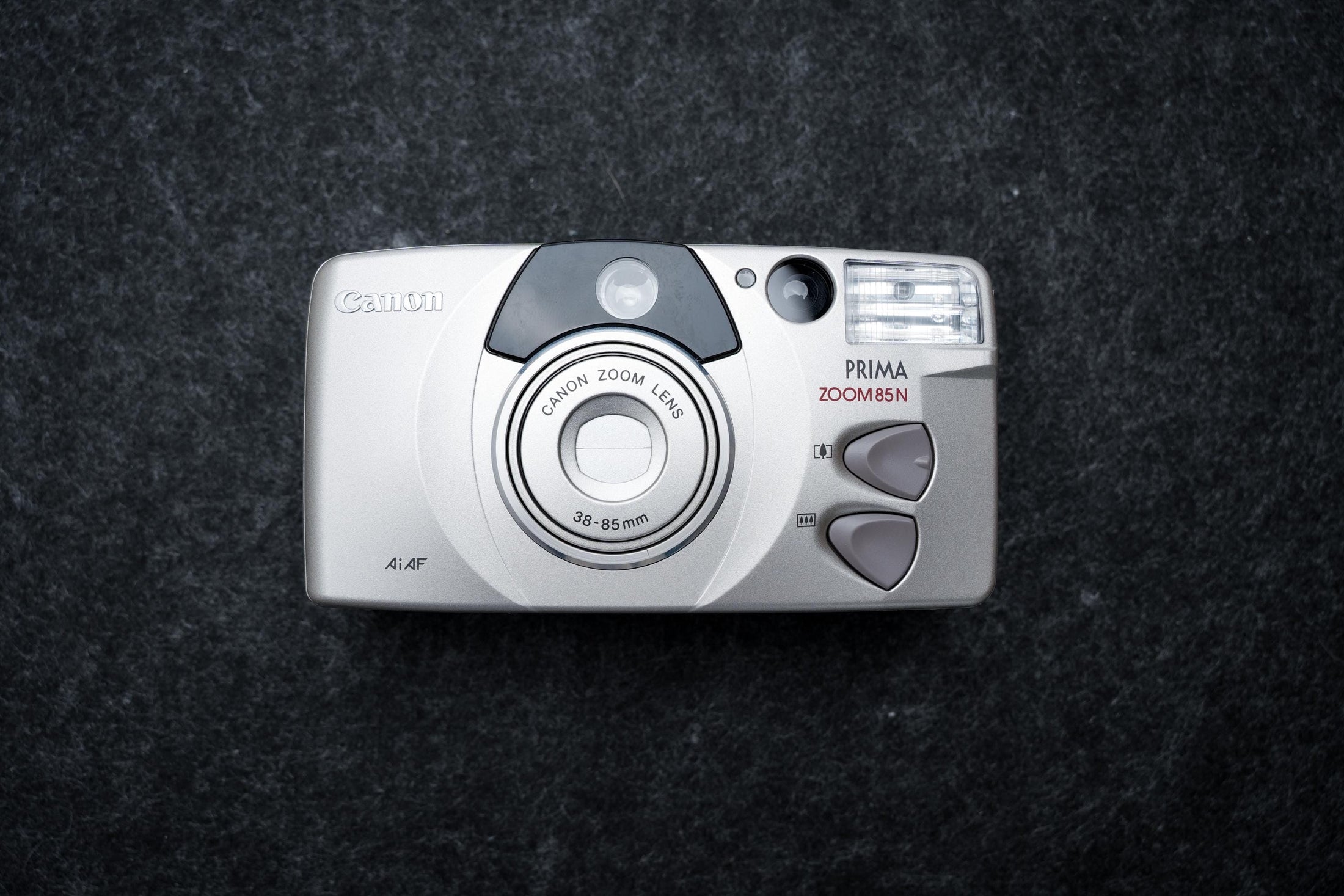 Canon Prima Zoom 85N + gratis 35mm film – 35mm point-and-shoot camera – 1998 – nieuw in doos, old stock