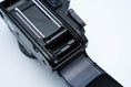 Load image into Gallery viewer, Nikon EM – Nikon Series E 50mm f/1.8 + Free Kodak Gold 35mm Film
