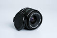 Load image into Gallery viewer, Canon FD 28mm f/2.8 Wide Angle Lens – Compact, Sharp and Perfect for Street Photography
