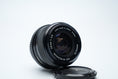 Load image into Gallery viewer, Minolta MD W.Rokkor 28mm f/2.8 Vintage Wide-Angle Lens – Ideal for Landscape and Street Photography
