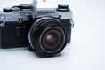 Load image into Gallery viewer, Olympus OM-10 + OM-System G.Zuiko 28mm f/3.5 + Free Kodak Gold 35mm
