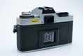 Load image into Gallery viewer, Minolta XG-1 + MC Rokkor-PF 50mm f/1.7 + free Kodak Gold 35mm film

