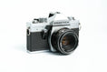 Load image into Gallery viewer, Praktica Super TL 3 + Pentacon 50mm f/1.8 – Classic SLR with free 35mm film
