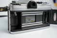 Load image into Gallery viewer, Konica FP – Classic 35mm SLR with Hexanon 135mm f/3.5 Lens – Tested and Working
