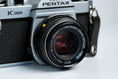 Load image into Gallery viewer, Pentax K1000 + SMC Pentax-M 50mm f/1.7 – Fully functional + free 35mm film
