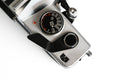 Load image into Gallery viewer, 'Praktica MTL 5 + Domiplan 50mm f/2.8 + free 35mm film – Reliable vintage SLR'
