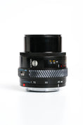 Load image into Gallery viewer, Minolta 35-70mm f/4 AF Zoom Lens – Compact and Versatile Classic
