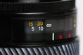 Load image into Gallery viewer, Minolta 35-70mm f/4 AF Zoom Lens – Compact and Versatile Classic
