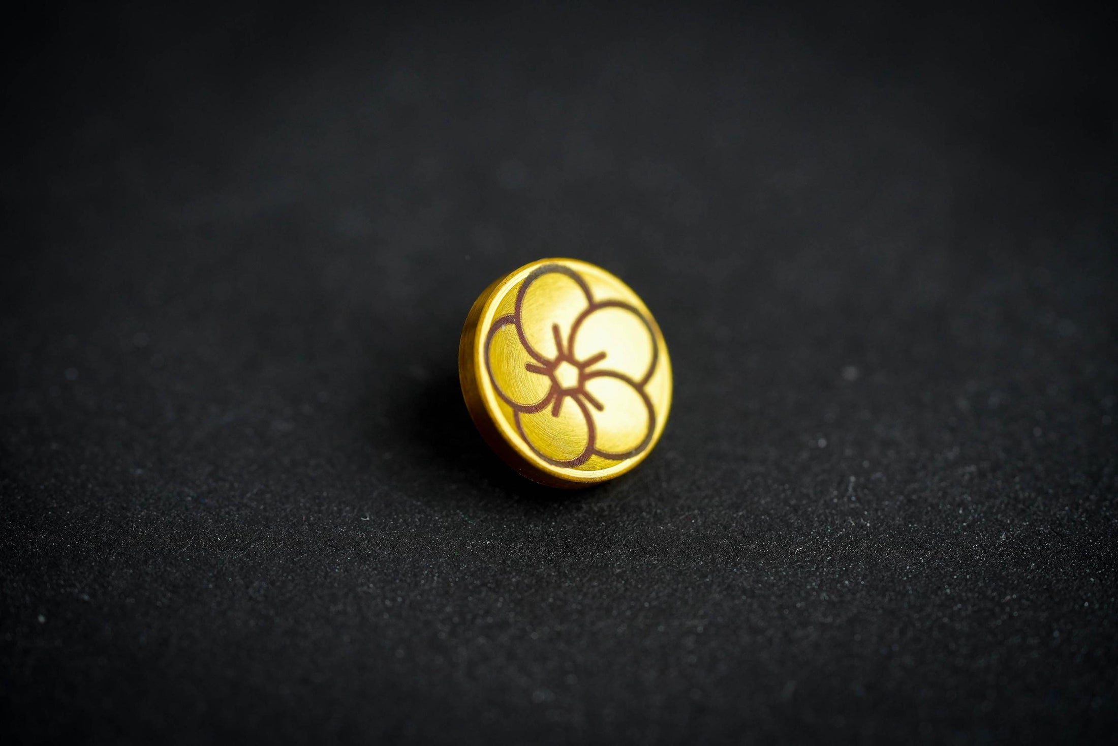 "Shutter button with flower engraving: Give your camera a luxury upgrade with this brass shutter button!"