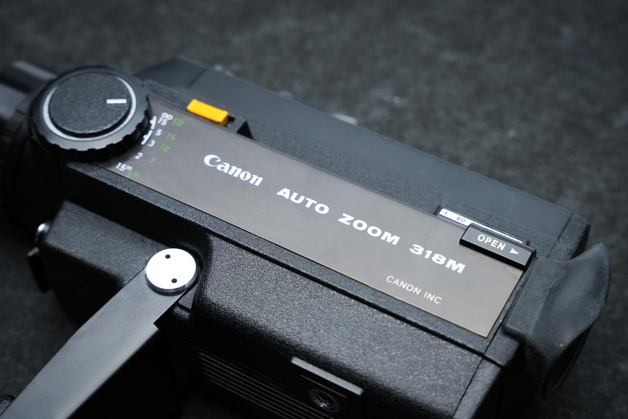 Canon Auto Zoom 318M Super 8 Camera uit 1976, macrofunctie en originele accessoires – ideaal voor filmmakers, reizigers en verzamelaars