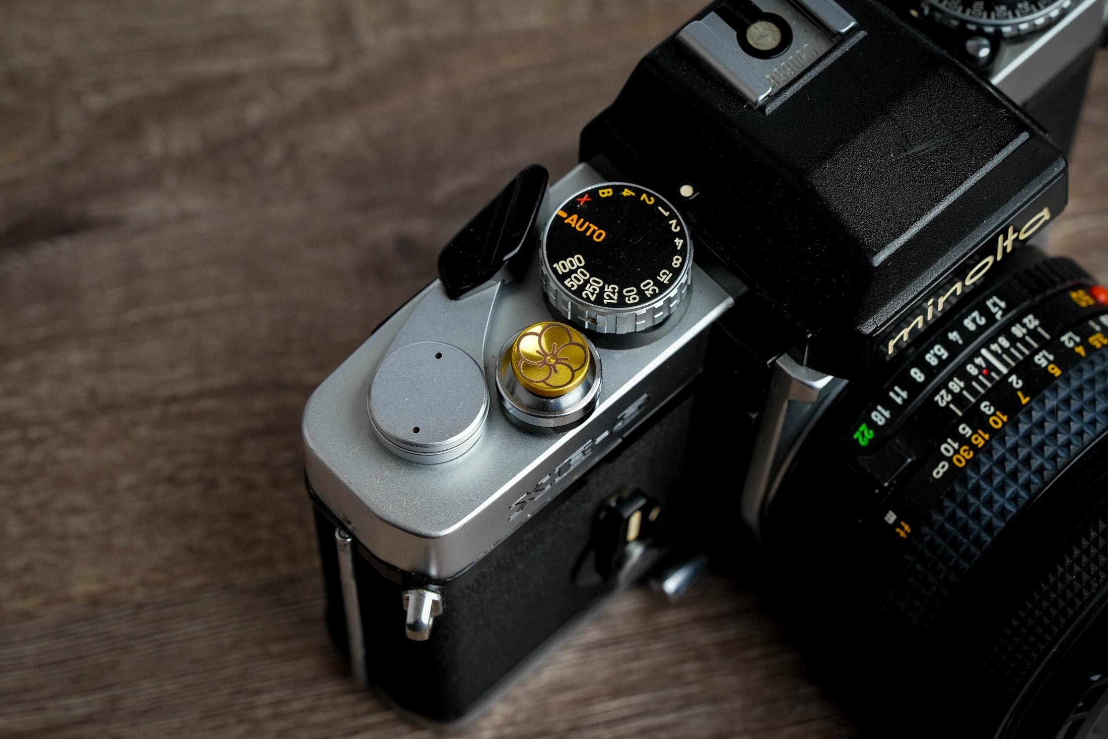 "Shutter button with flower engraving: Give your camera a luxury upgrade with this brass shutter button!"