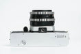 Load image into Gallery viewer, Praktica L + Carl Zeiss Jena 50mm f/2.8 + Free 35mm film – Classic DDR SLR
