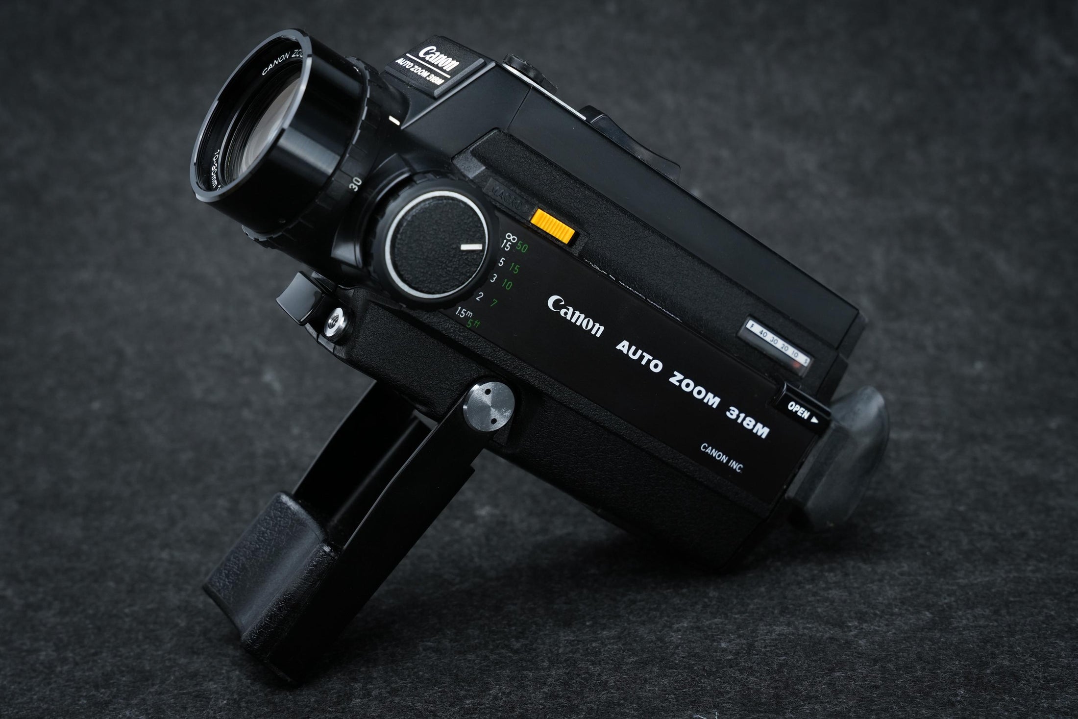 Canon Auto Zoom 318M Super 8 Camera uit 1976, macrofunctie en originele accessoires – ideaal voor filmmakers, reizigers en verzamelaars