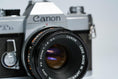 Load image into Gallery viewer, Canon FTb + 50mm f/1.8 SC + Free Kodak Gold – Vintage 35mm SLR | Fully working

