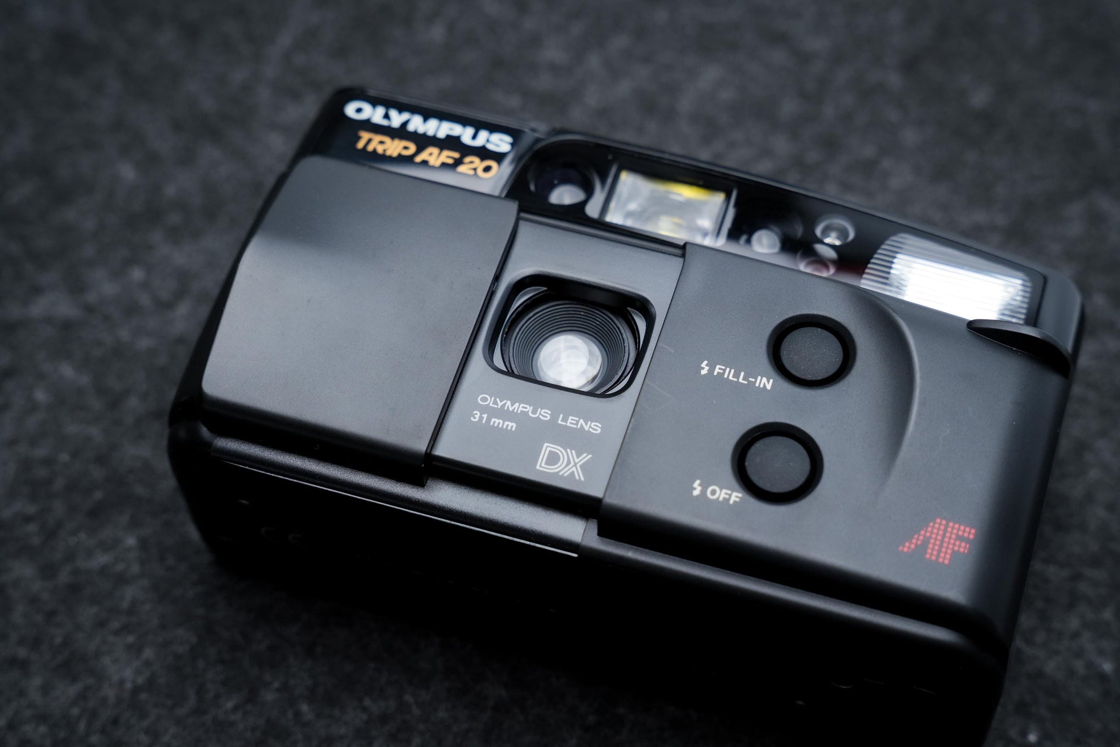 Olympus Trip AF 20 + gratis 35mm film – 35mm compact camera – 1995 – nieuw in doos, old stock, getest