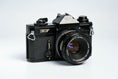 Load image into Gallery viewer, Canon EF + 50mm F1.8 SC + Free Kodak Gold – Vintage 35mm SLR | Fully working
