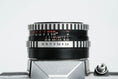 Load image into Gallery viewer, Praktica L + Carl Zeiss Jena 50mm f/2.8 + Free 35mm film – Classic DDR SLR
