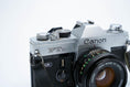 Load image into Gallery viewer, Canon FTb + 50mm f/1.8 + Free Kodak Gold 35mm
