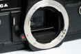 Load image into Gallery viewer, 'Praktica BCA + Prakticar 50mm f/2.4 + free 35mm film – Electronic vintage SLR'
