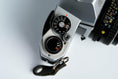 Load image into Gallery viewer, Pentax K1000 + SMC Pentax-M 50mm f/1.7 – Fully functional + free 35mm film
