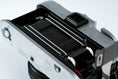 Load image into Gallery viewer, Canon FT QL + Tokina RMC 28mm f/2.8 – Fully functional + free 35mm film
