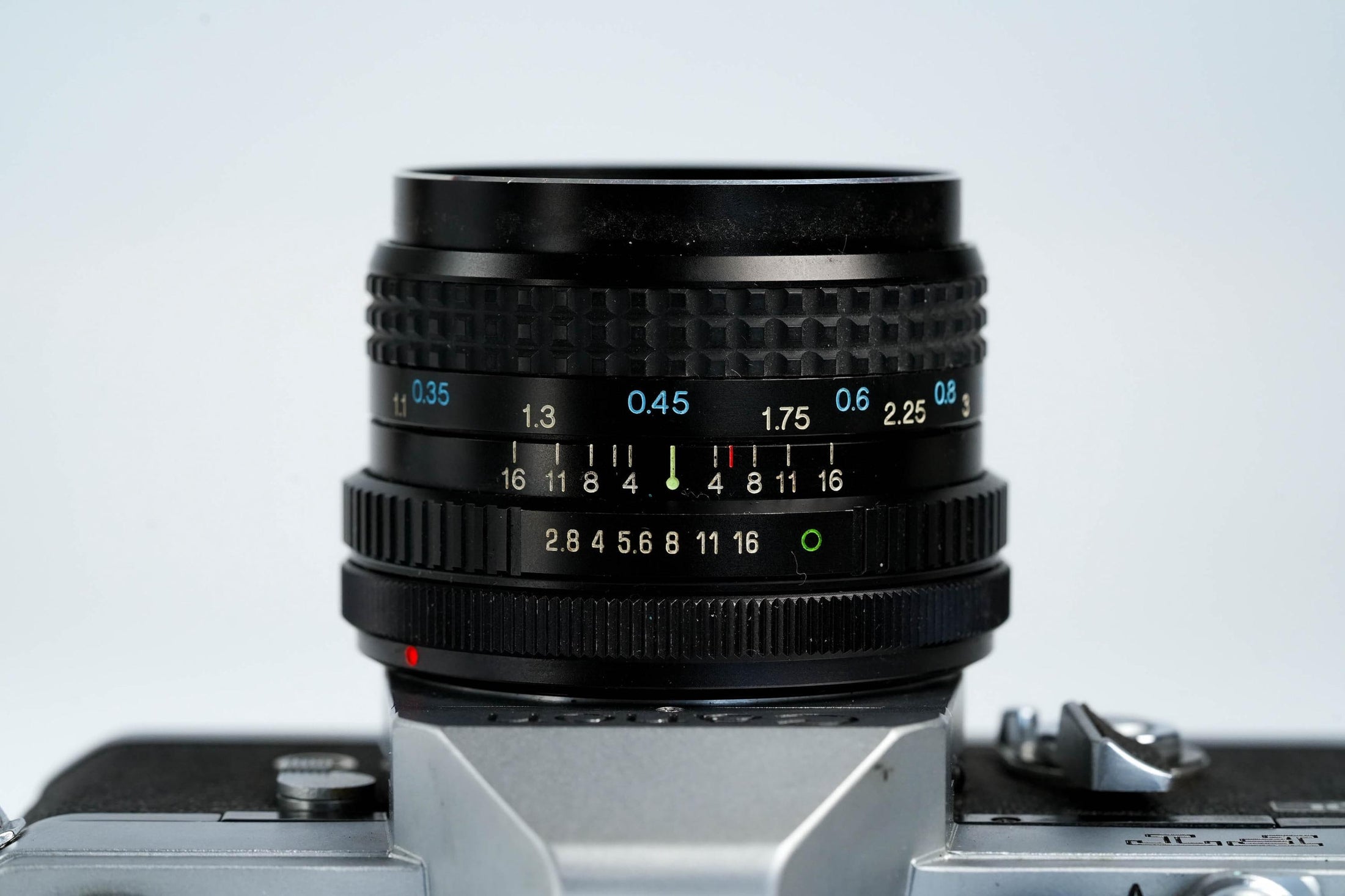 Canon FT QL + Tokina RMC 28mm f/2.8 – Fully functional + free 35mm film
