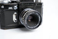 Load image into Gallery viewer, Edixa-mat Kadett – Mechanical German SLR with Edixa Auto-Cassaron 50mm f/2.8 Lens
