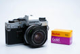 Load image into Gallery viewer, Olympus OM-10 + OM-System G.Zuiko 28mm f/3.5 + Free Kodak Gold 35mm
