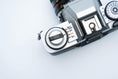 Load image into Gallery viewer, Minolta XG-1 + MC Rokkor-PF 50mm f/1.7 + free Kodak Gold 35mm film
