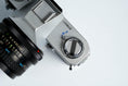 Load image into Gallery viewer, Canon FT QL + Tokina RMC 28mm f/2.8 – Fully functional + free 35mm film
