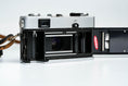 Load image into Gallery viewer, Olympus 35 SP + G. Zuiko 42mm f/1.7 + Free Kodak Gold – Rare rangefinder | Fully working | With learning cover and lens cap
