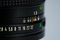 Load image into Gallery viewer, Canon FD 135mm f/2.8 Telephoto Lens – Powerful Portrait Lens with Beautiful Bokeh
