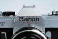 Load image into Gallery viewer, Canon FT QL + 50mm f/1.8 – Fully working + free 35mm film
