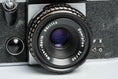 Load image into Gallery viewer, Praktica Super TL + Meyer-Optik Görlitz Domiplan 50mm f/2.8 + free 35mm film – Vintage SLR
