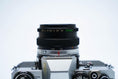 Load image into Gallery viewer, Olympus OM-10 – Zuiko 50mm f/1.8 + Free Kodak Gold 35mm Film
