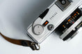 Load image into Gallery viewer, Olympus 35 SP + G. Zuiko 42mm f/1.7 + Free Kodak Gold – Rare rangefinder | Fully working | With learning cover and lens cap
