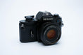 Load image into Gallery viewer, Nikon EM – Nikon Series E 50mm f/1.8 + Free Kodak Gold 35mm Film
