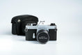 Load image into Gallery viewer, Pentax Spotmatic F + SMC Takumar 55mm f/1.8 – Fully functional + free 35mm film
