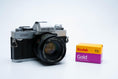 Load image into Gallery viewer, Minolta XG-1 + MC Rokkor-PF 50mm f/1.7 + free Kodak Gold 35mm film
