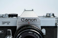 Load image into Gallery viewer, Canon FT QL + Tokina RMC 28mm f/2.8 – Fully functional + free 35mm film
