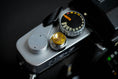Load image into Gallery viewer, "Shutter button with flower engraving: Give your camera a luxury upgrade with this brass shutter button!"
