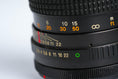 Load image into Gallery viewer, Tokina 135mm f2.8 (Canon FD) – Classic Telephoto Lens with Fast Aperture

