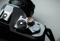 Load image into Gallery viewer, Handmade Engraved Relax Button – Vintage & Modern Camera Accessory
