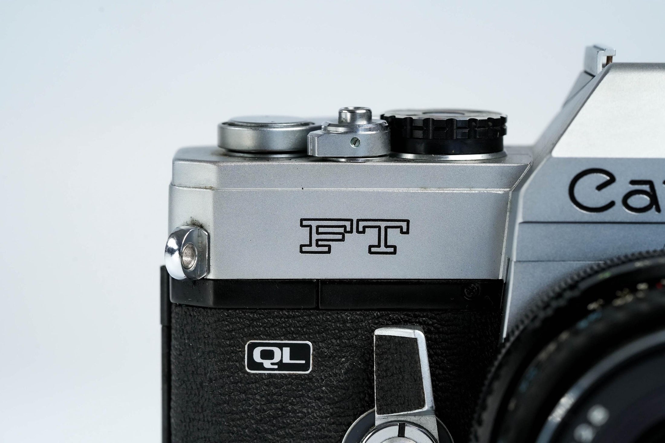Canon FT QL + Tokina RMC 28mm f/2.8 – Fully functional + free 35mm film
