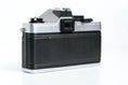 Load image into Gallery viewer, 'Praktica MTL 5 + Domiplan 50mm f/2.8 + free 35mm film – Reliable vintage SLR'
