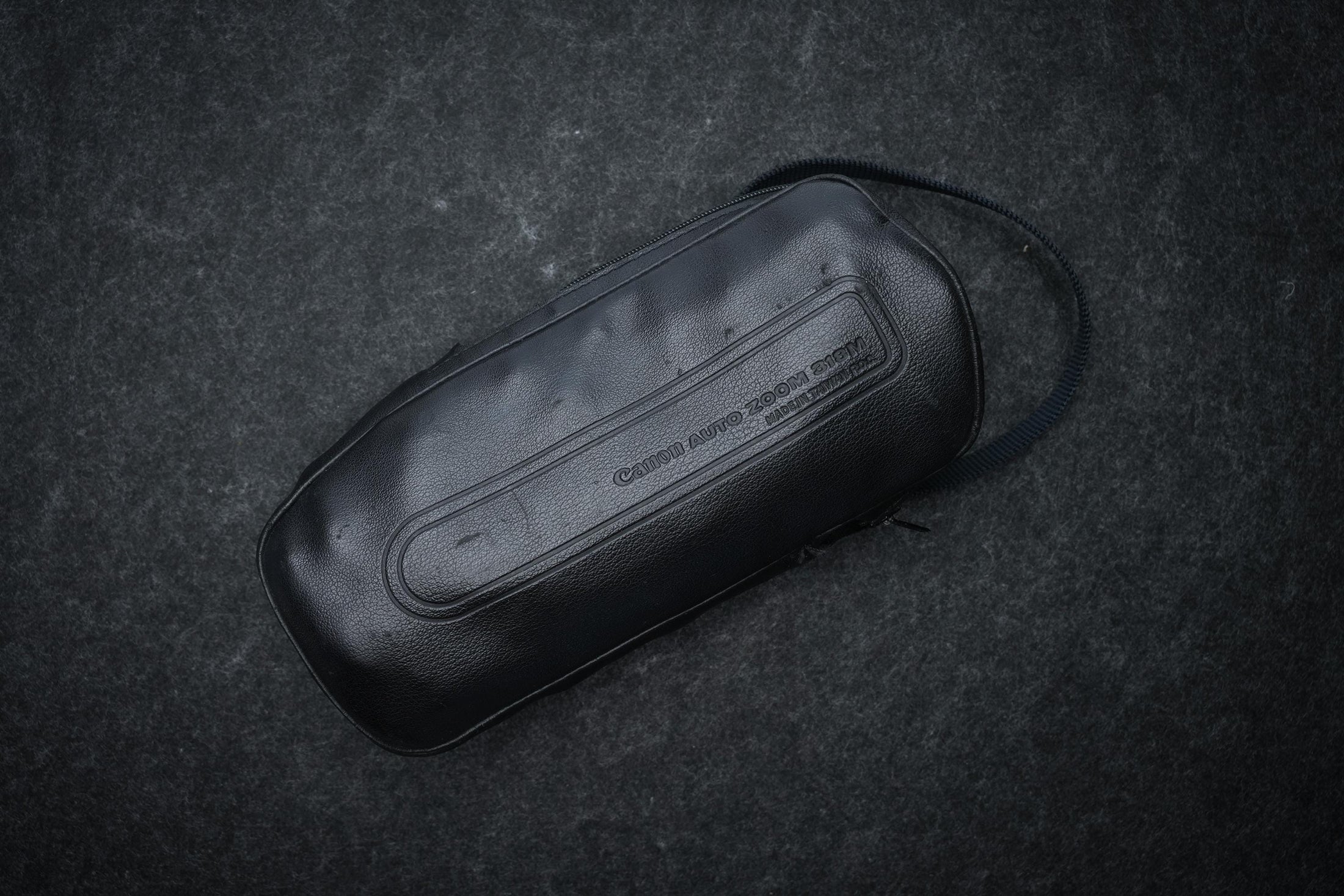 Canon Auto Zoom 318M Super 8 Camera uit 1976, macrofunctie en originele accessoires – ideaal voor filmmakers, reizigers en verzamelaars